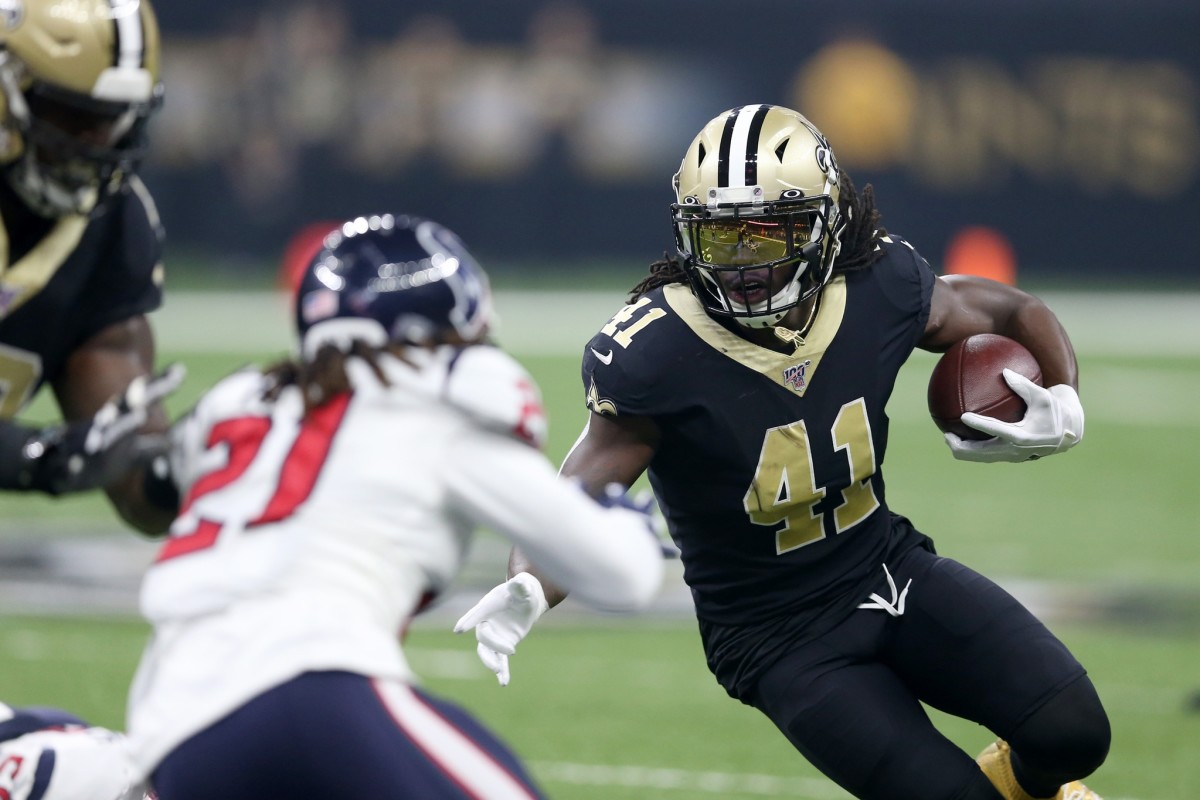 New Orleans Saints running back Alvin Kamara (41) defended by Houston Texans cornerback Bradley Roby (21). Mandatory Credit: Chuck Cook-USA TODAY Sports